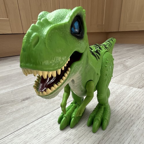 Green plastic rex dinosaur - plastic,